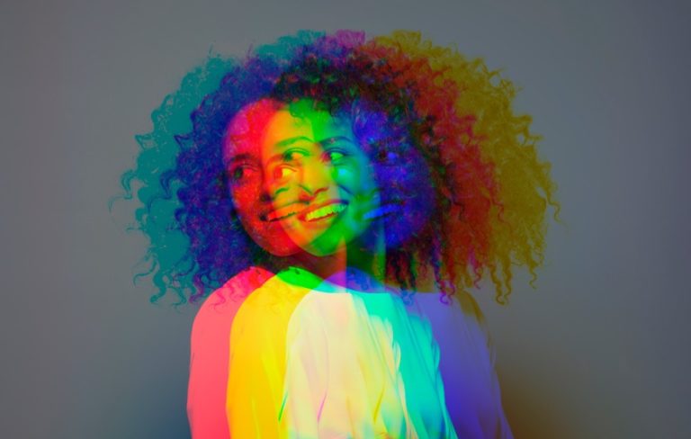 woman rendered with multiple layers of wavy color