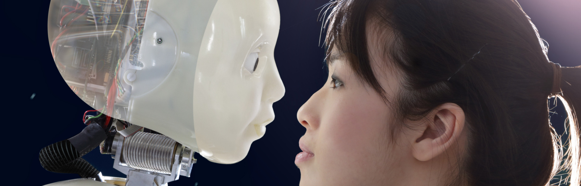 Woman and robot face to face